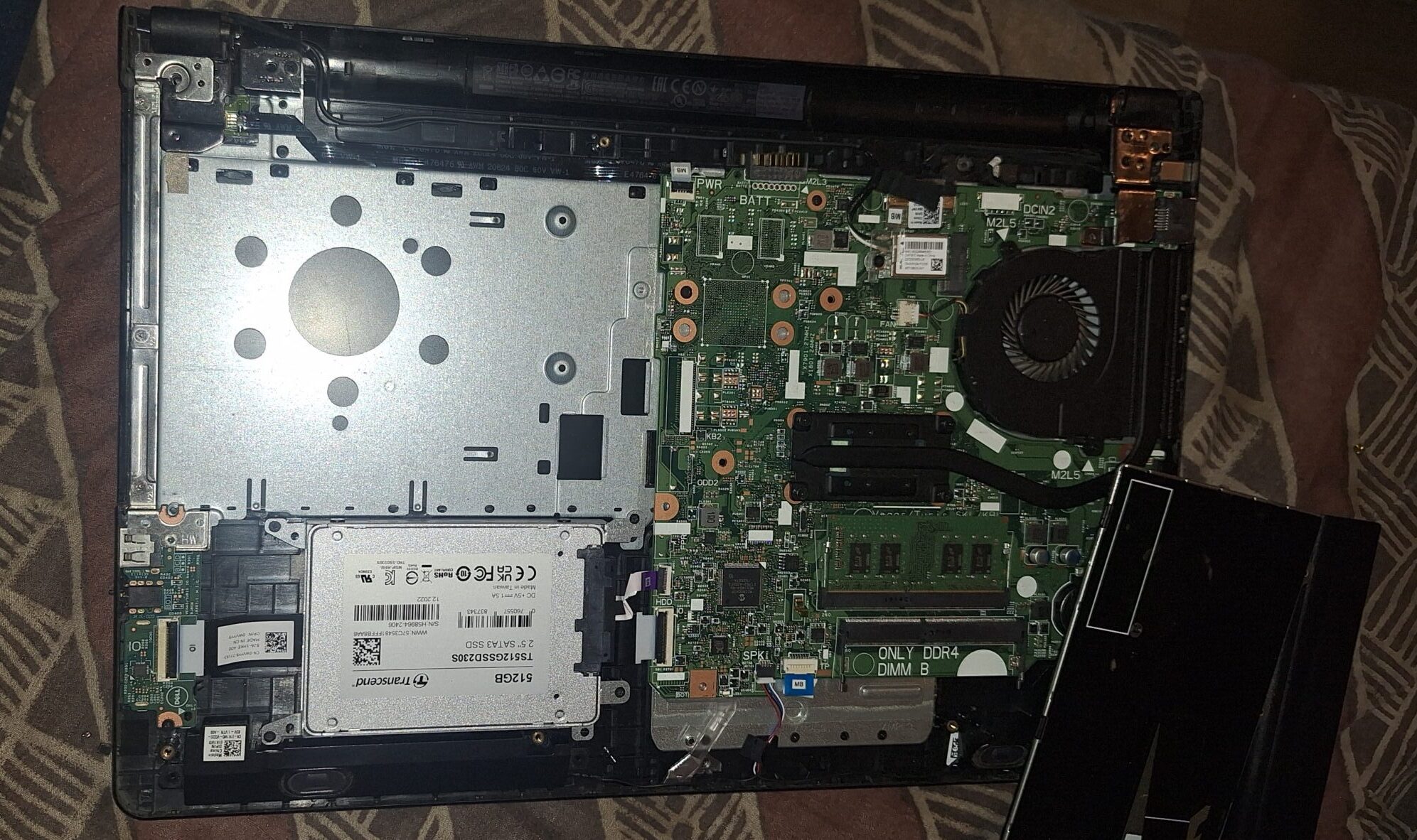 Dell Inspiron opened showing the Transcend SSD230S 512GB inside